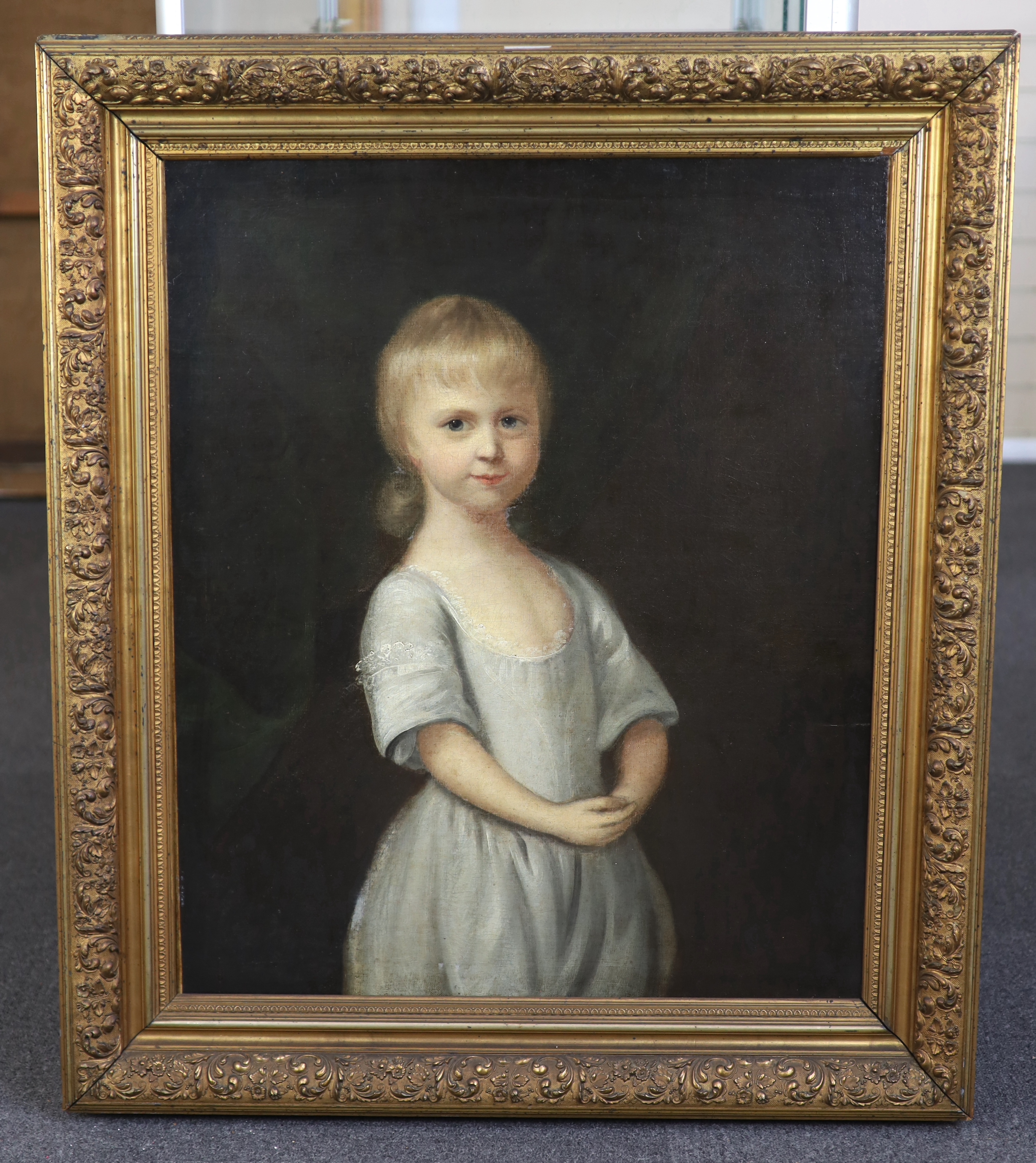 18th century English School, Portrait of a child standing wearing a blue dress, oil on canvas, 75 x 62cm